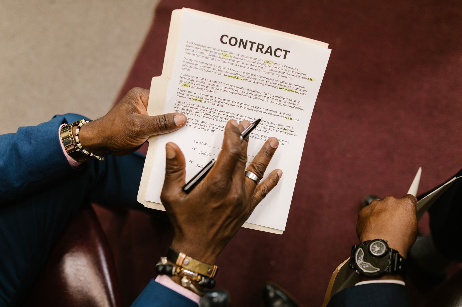 Corporate lawyers reviewing Italian company restructuring documents